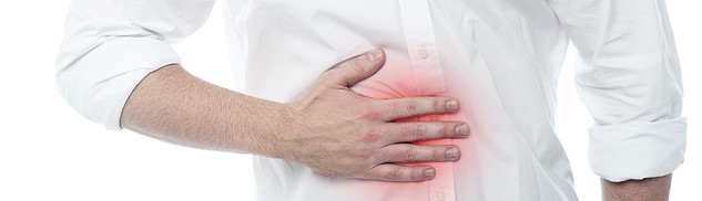Stomach ache man placing hand on the spot.